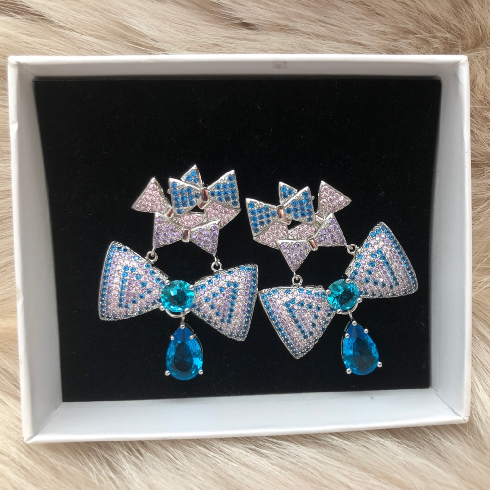 Blue crystal bow earrings